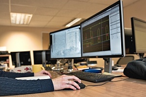 designer employee working on a computer 