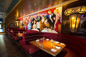 custom wall panel at restaurant next to tables