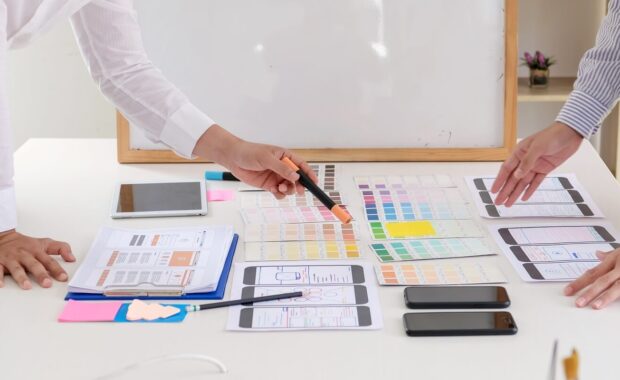 designers development meeting ux ui website of mobile phone at the office