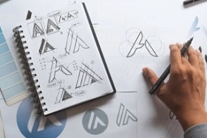 graphics designer designing brand logo