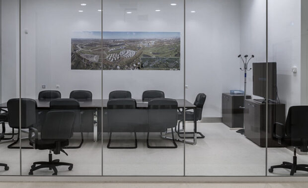 modern meeting room with transparent partitions with acoustic panels