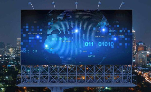 planet map on billboard over night panoramic cityscape of Bangkok