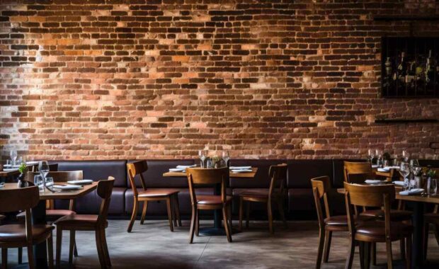 restaurant with tables chairs and a commercial wall covering