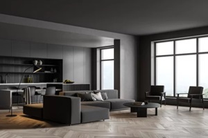 corner of panoramic living room, dark grey kitchen with square niche