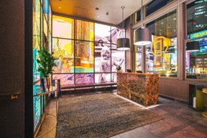 OP Chicago Hostess lobby with backlit acrylics with different background colors