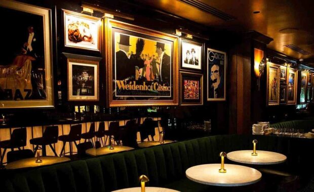 Acrylic mirror custom finishing hanging on fancy restaurant wall