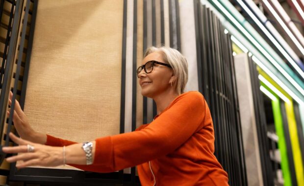business owner picking custom wall covering for commercial space